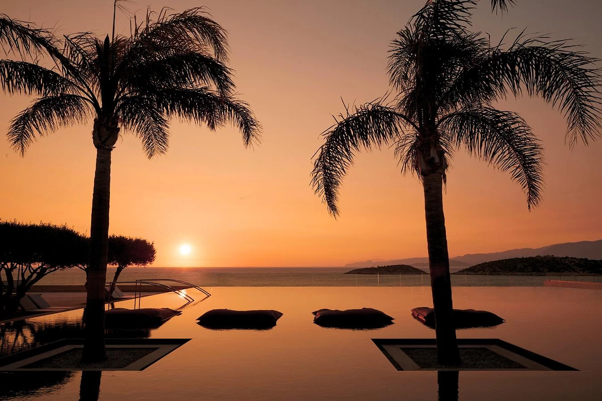 Piscine au coucher du soleil, Minos Palace Hotel & Suites, Crète, Grèce